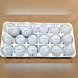 20 Titleist ProV1 white golf balls. Good to Very Good playing condition